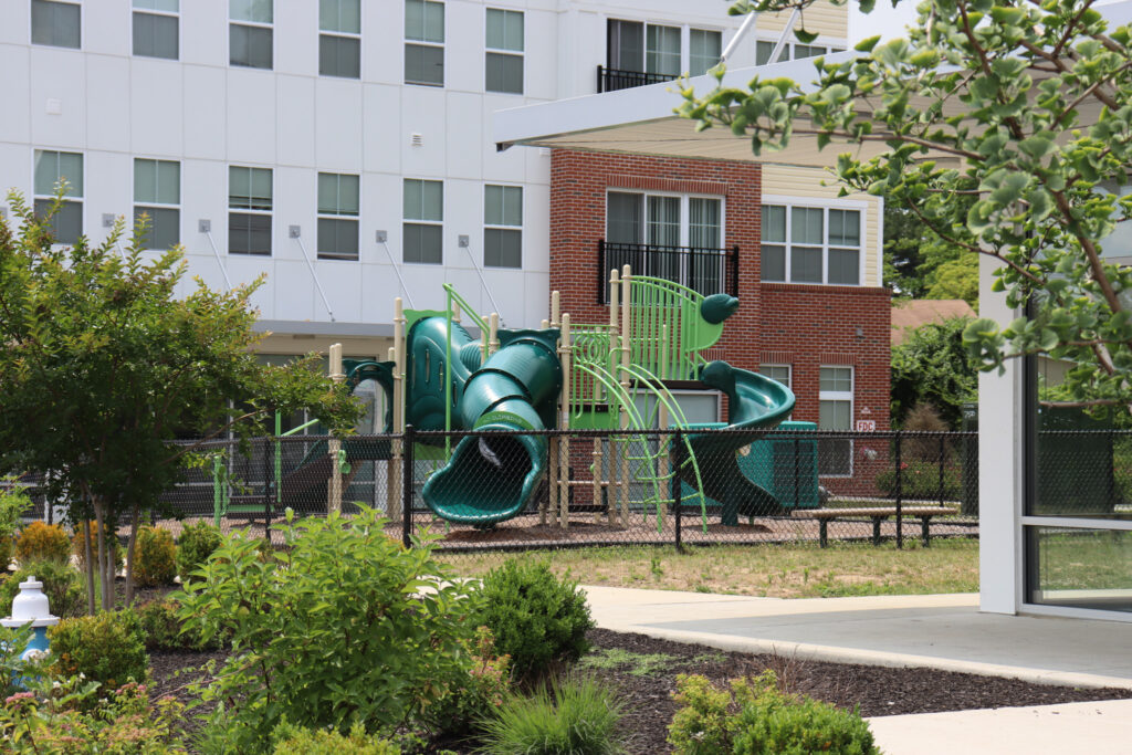 A playground outside the Centerton Village building.