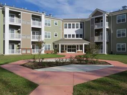 Permanent Housing program Exterior of affordable housing complex Waterfront Village